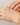 Applying natural tallow balm to dry, flaky hands